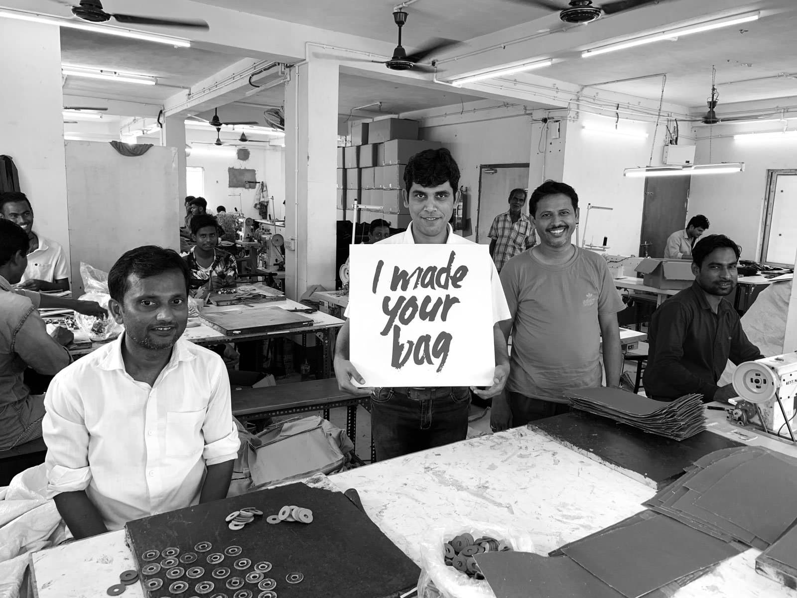 Royaa production team making bags