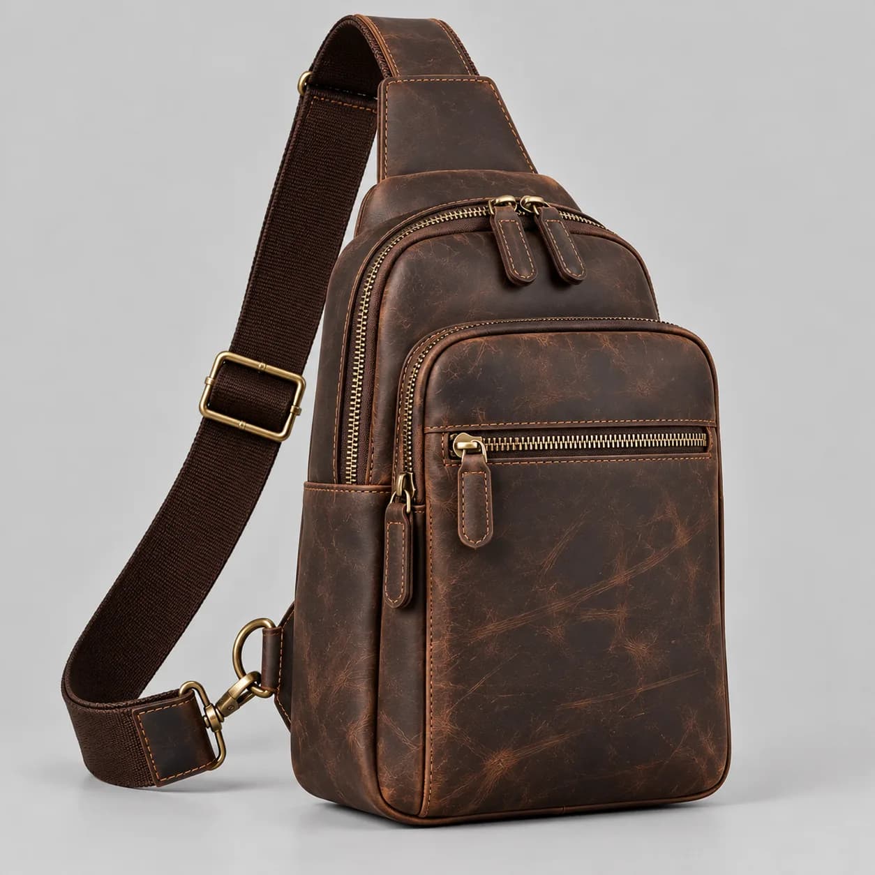 Leather chest bag main view on a neutral studio background