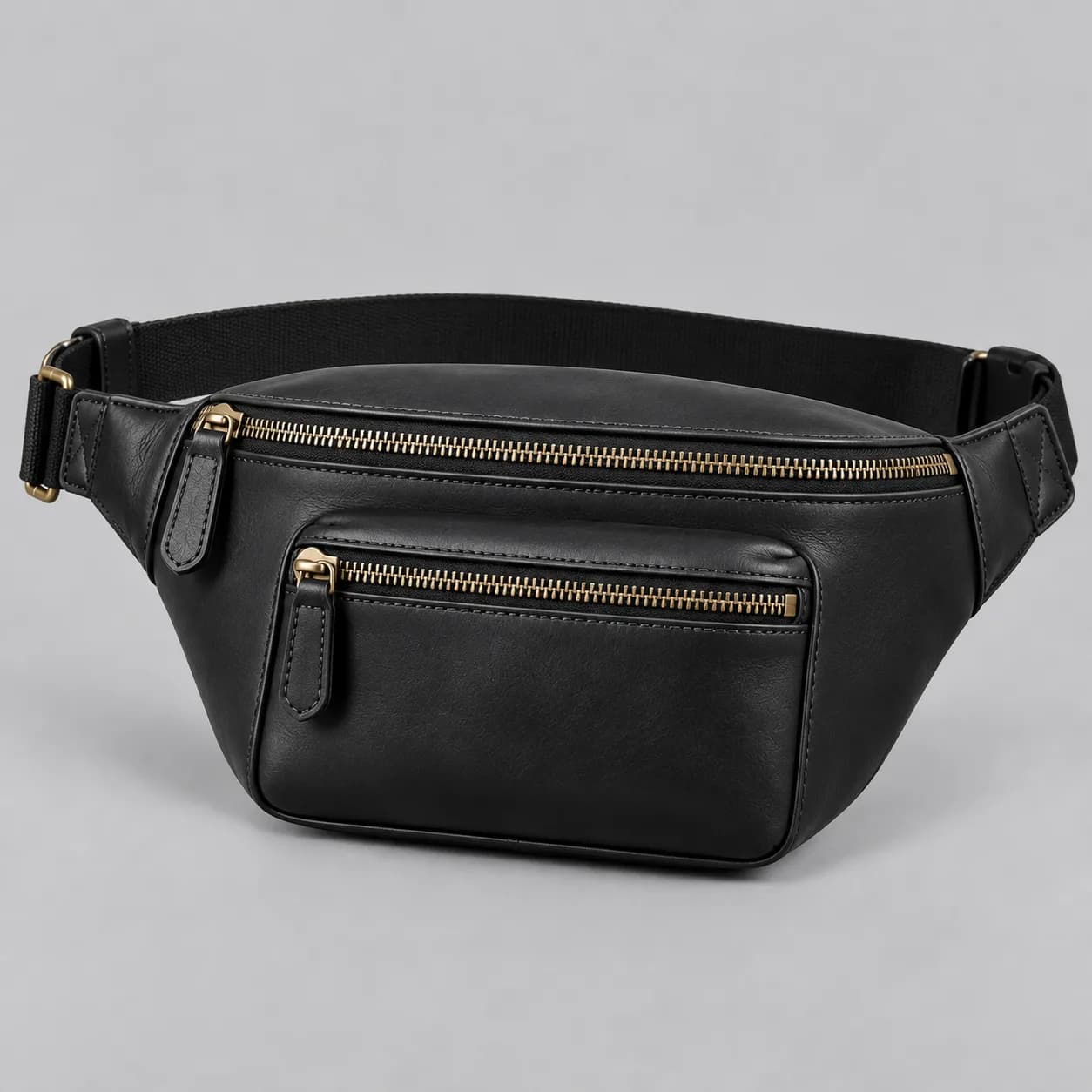 Leather fanny pack product direction on a neutral studio background