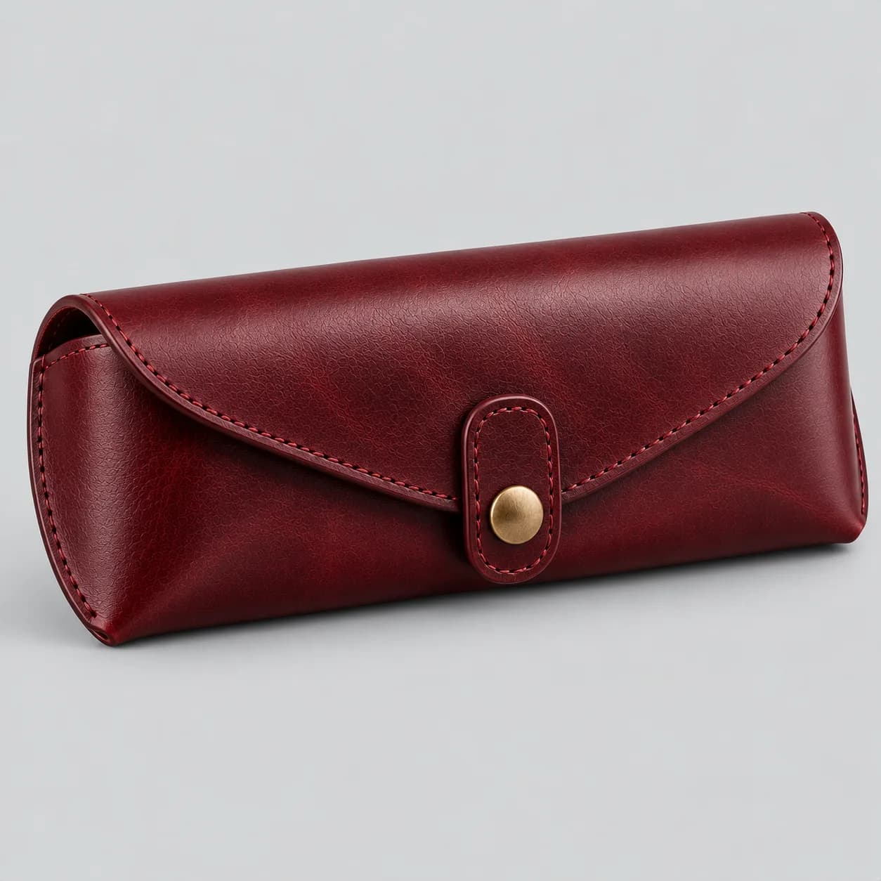 Leather sunglasses case product direction on a neutral studio background