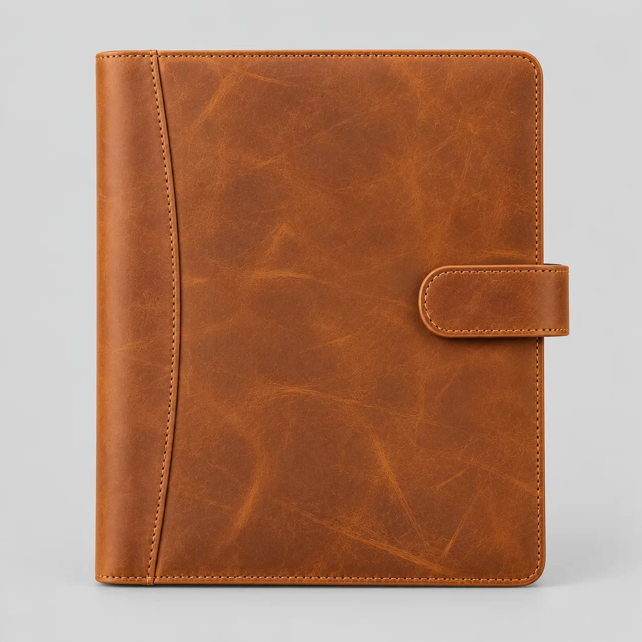 Leather portfolio product direction on a neutral studio background