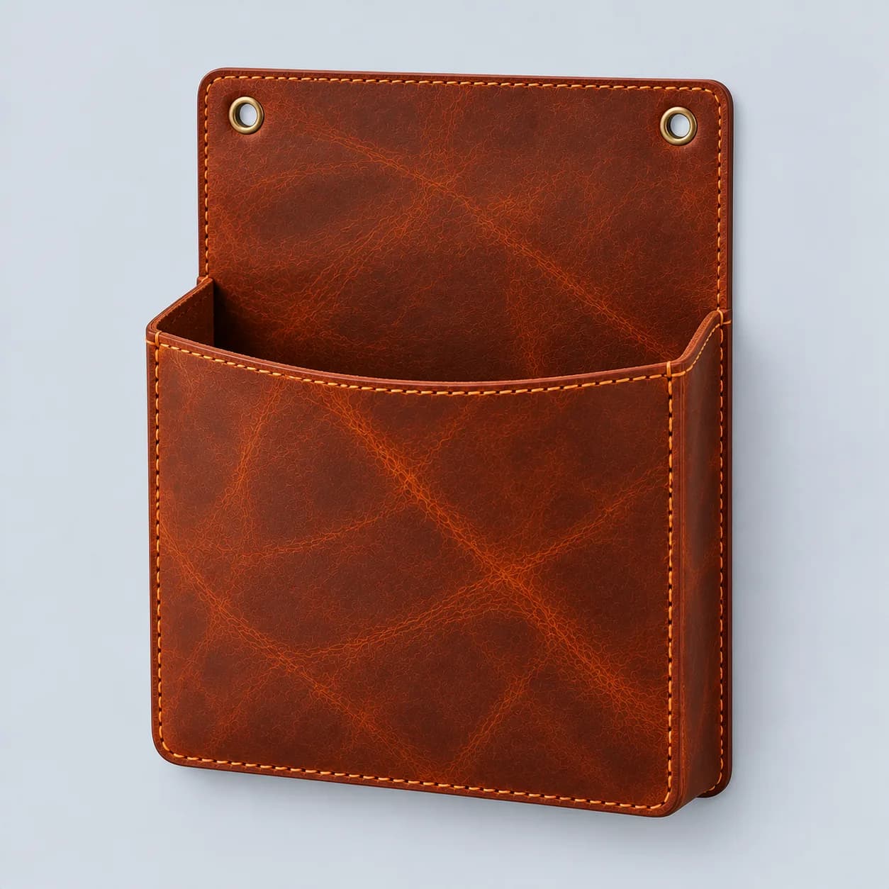 Leather wall pocket product direction on a neutral studio background