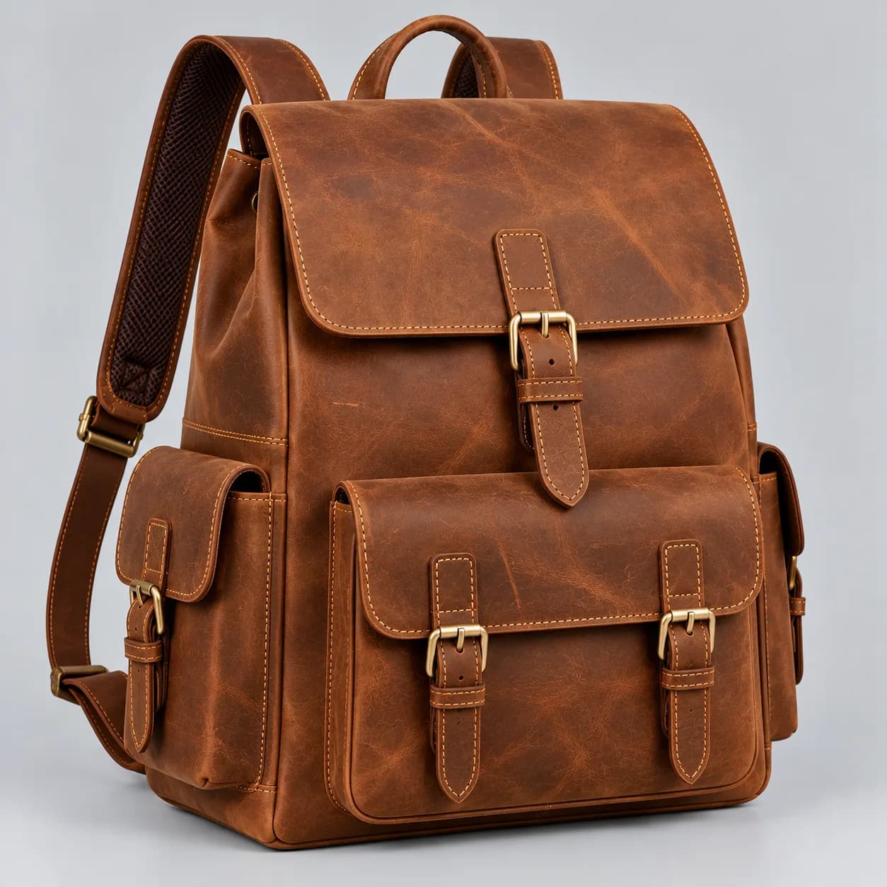 Leather backpack product direction on a neutral studio background