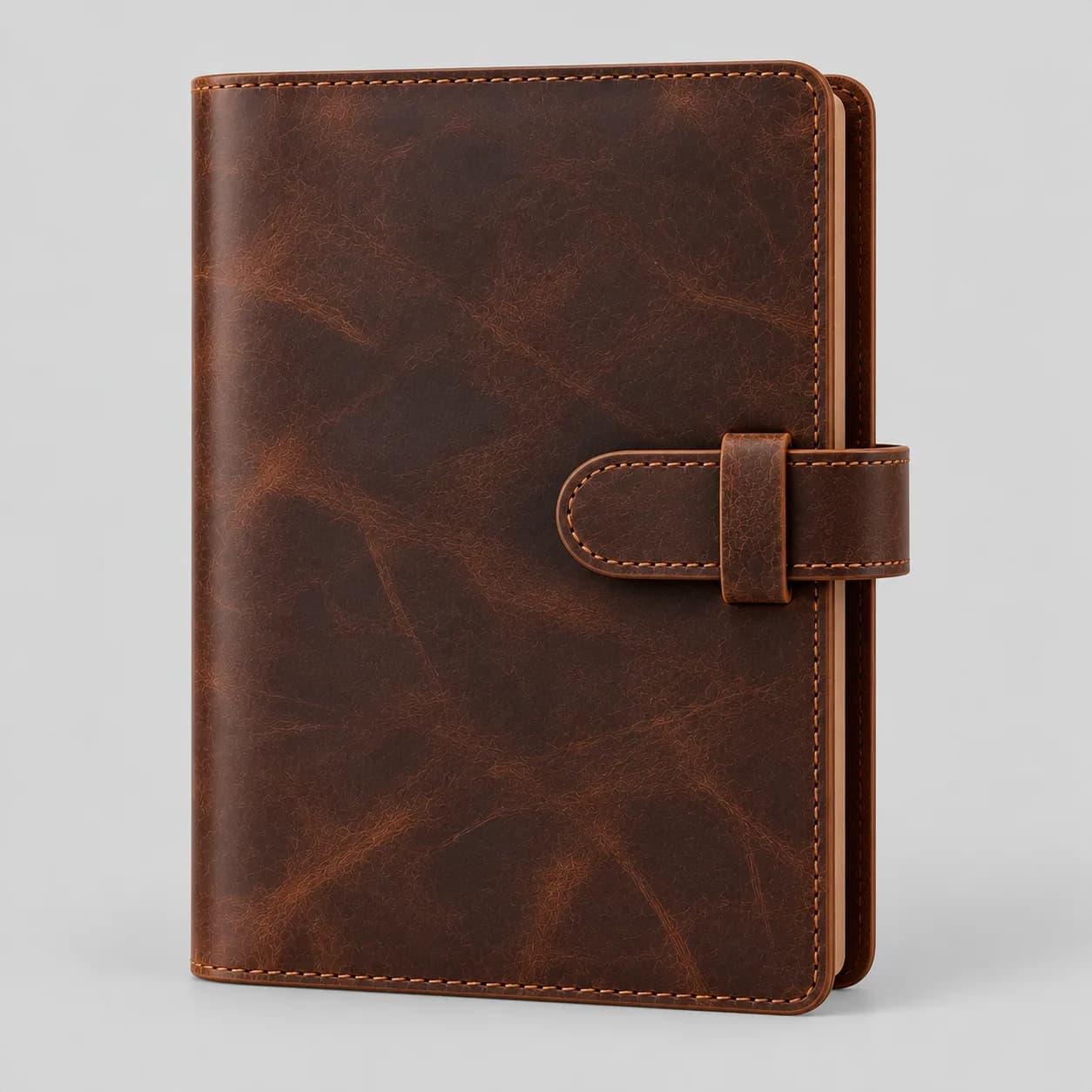 Leather journal and notebook cover product direction on a neutral studio background