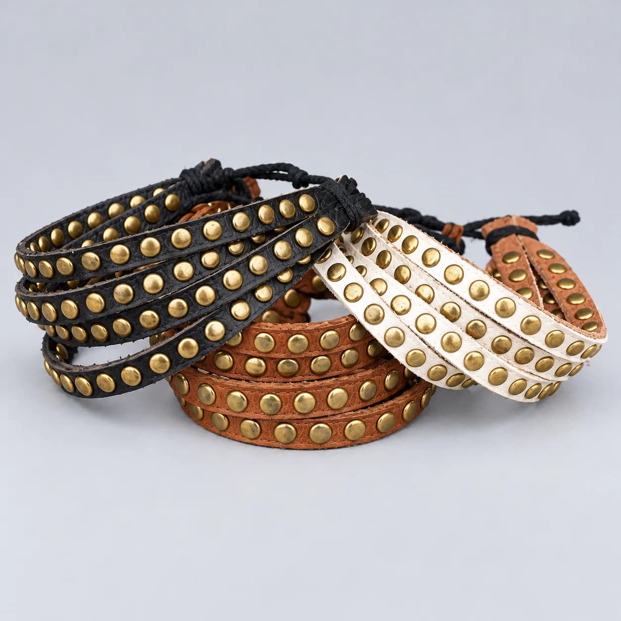 Leather bracelet product direction on a neutral studio background
