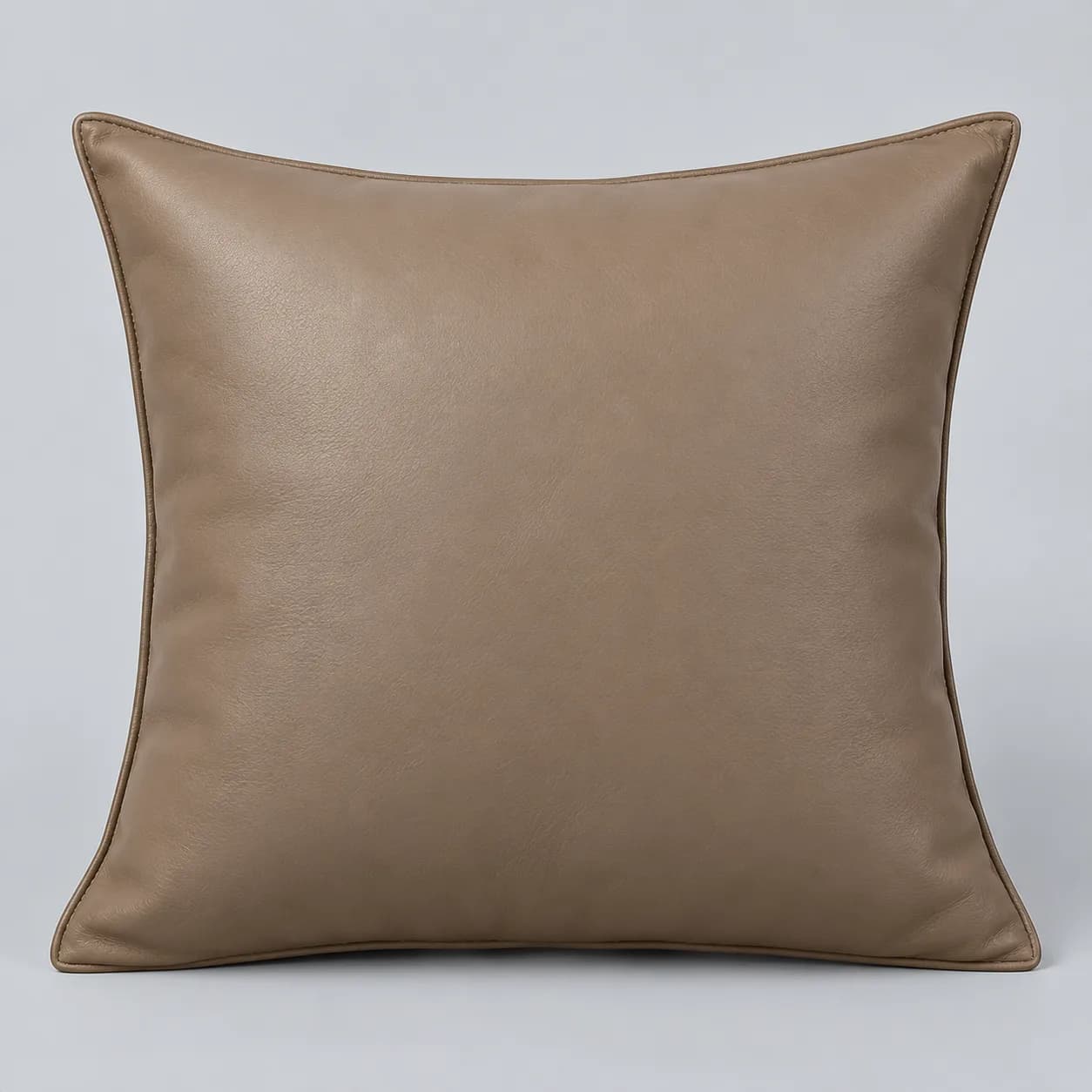 Leather pillow cover product direction on a neutral studio background